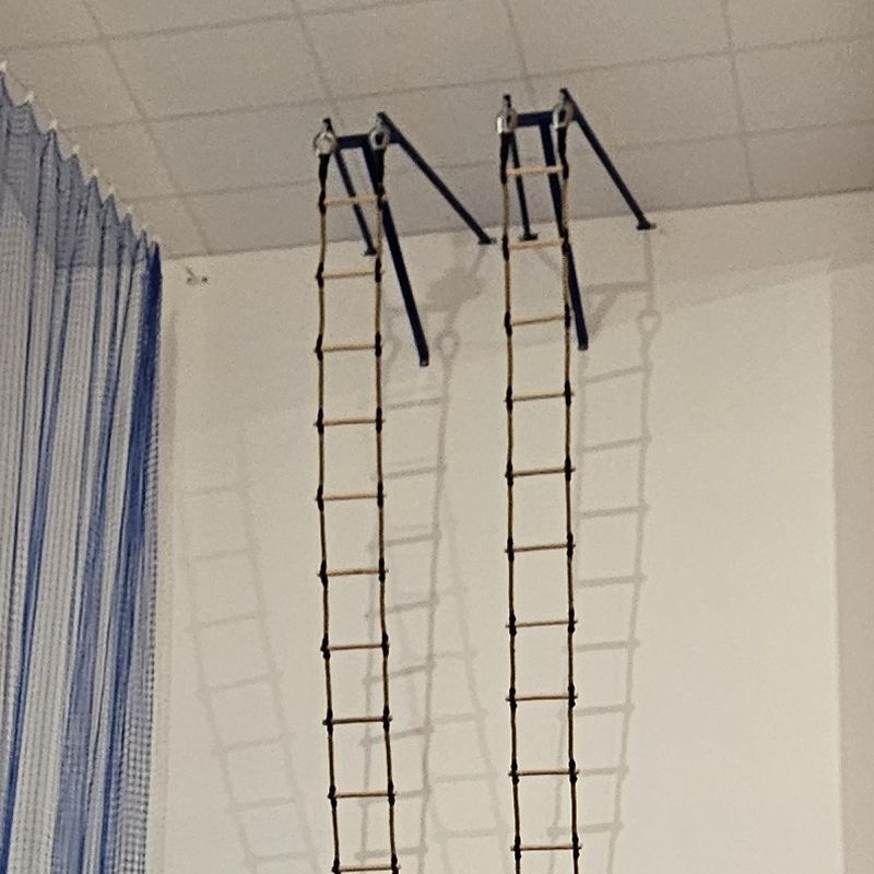 Bracket for attaching the string ladder